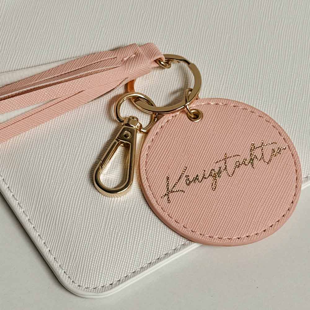 Rosa Schlüsselanhänger mit der Aufschrift Königstochter